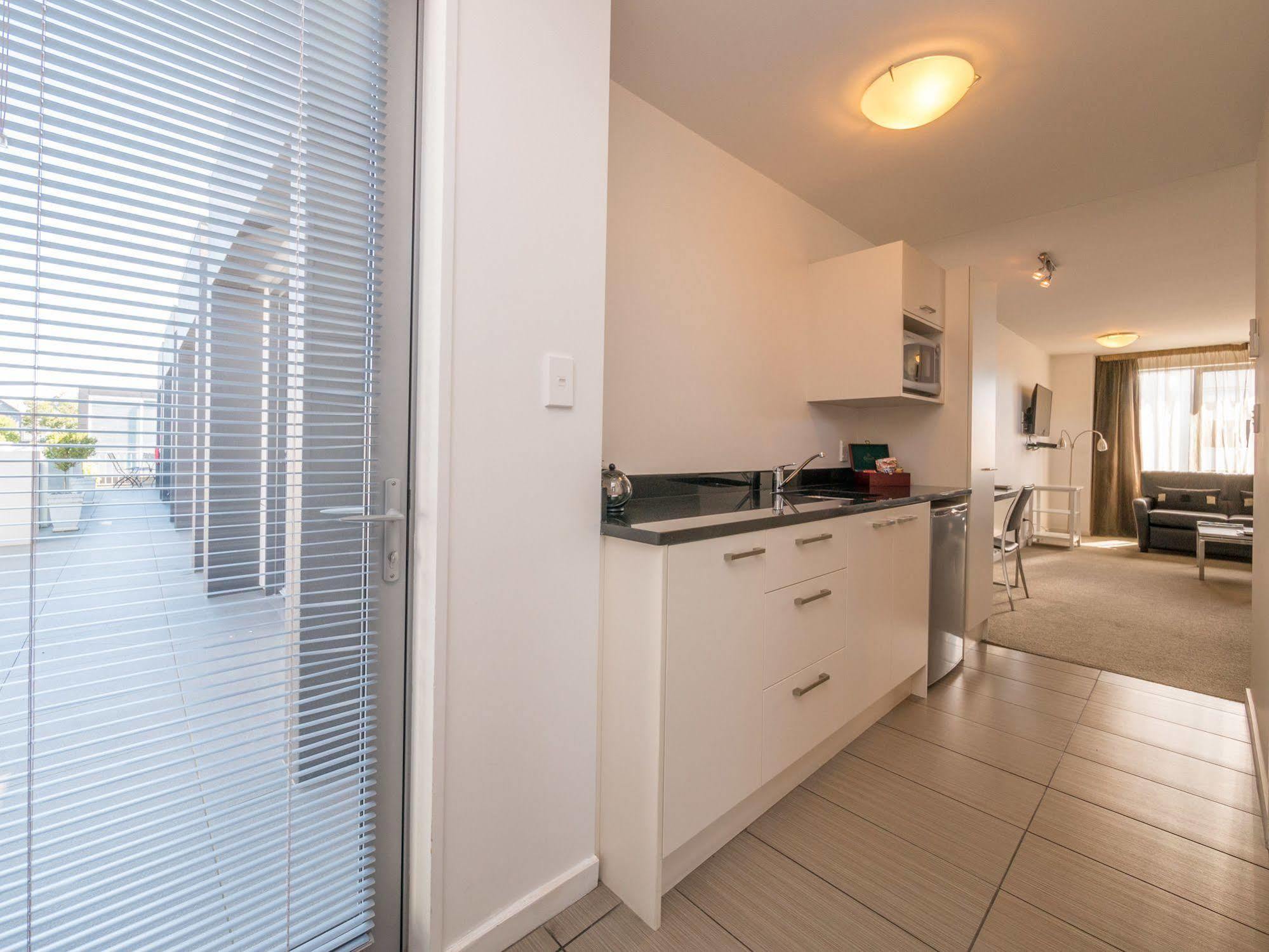 Bellano Motel Suites Christchurch Exterior foto A typical apartment